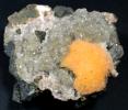 Mesolite spikes on orange thomsonite balls from India, myth or reality?